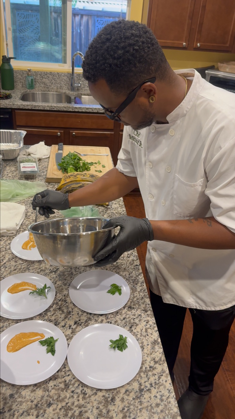 Chef King plating a coursed private chef dinner in a client's home